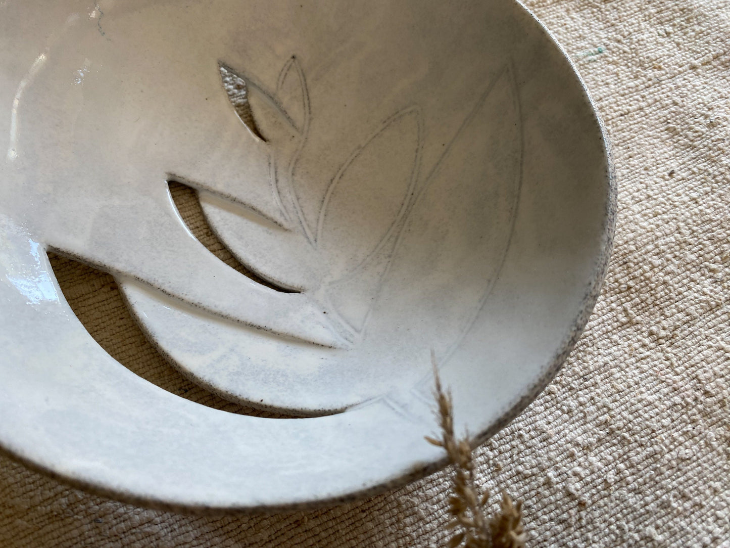 White Ceramic Bowl with Leaf Cutouts